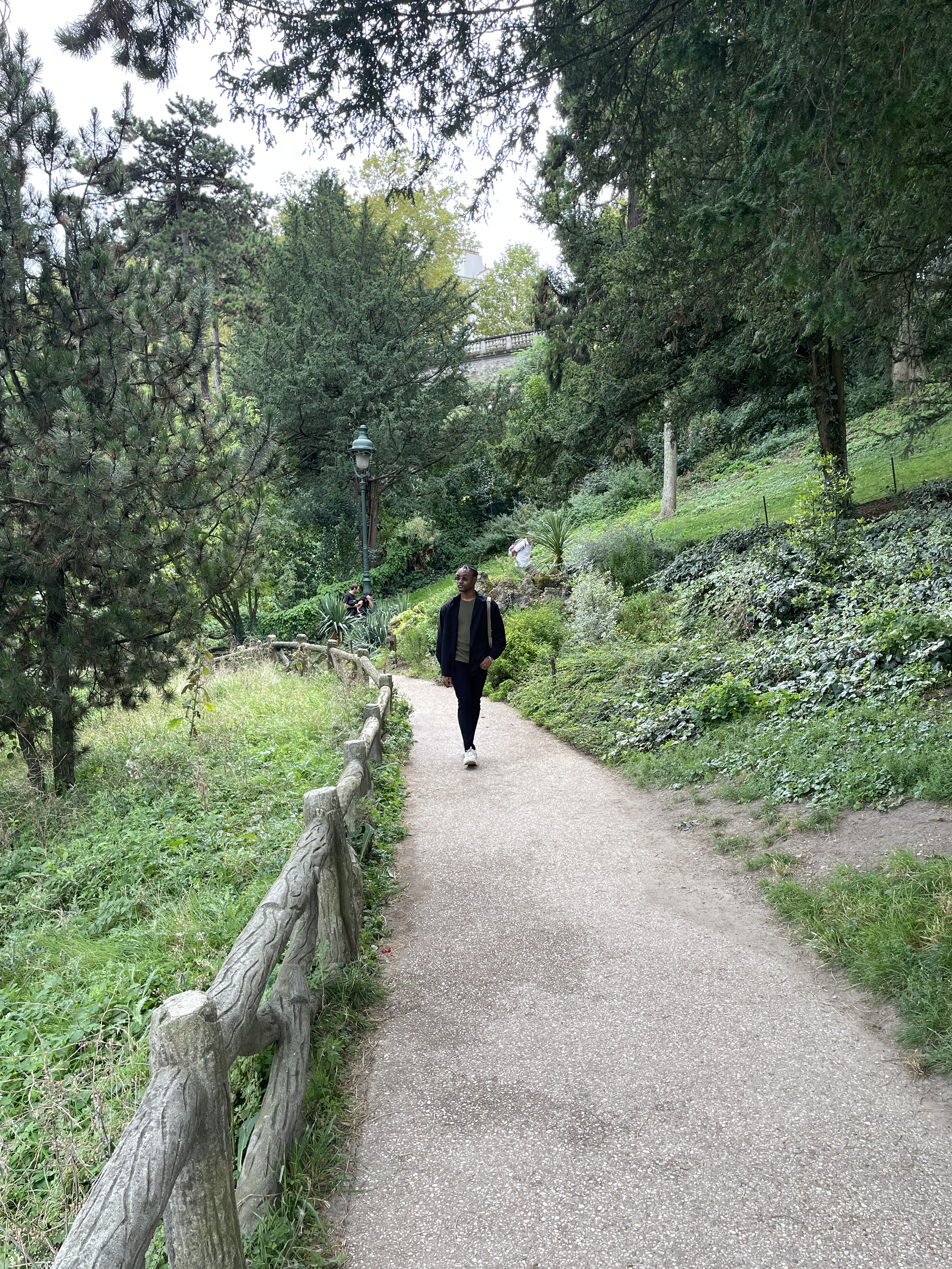 a picture of osase emokpae walking in a park